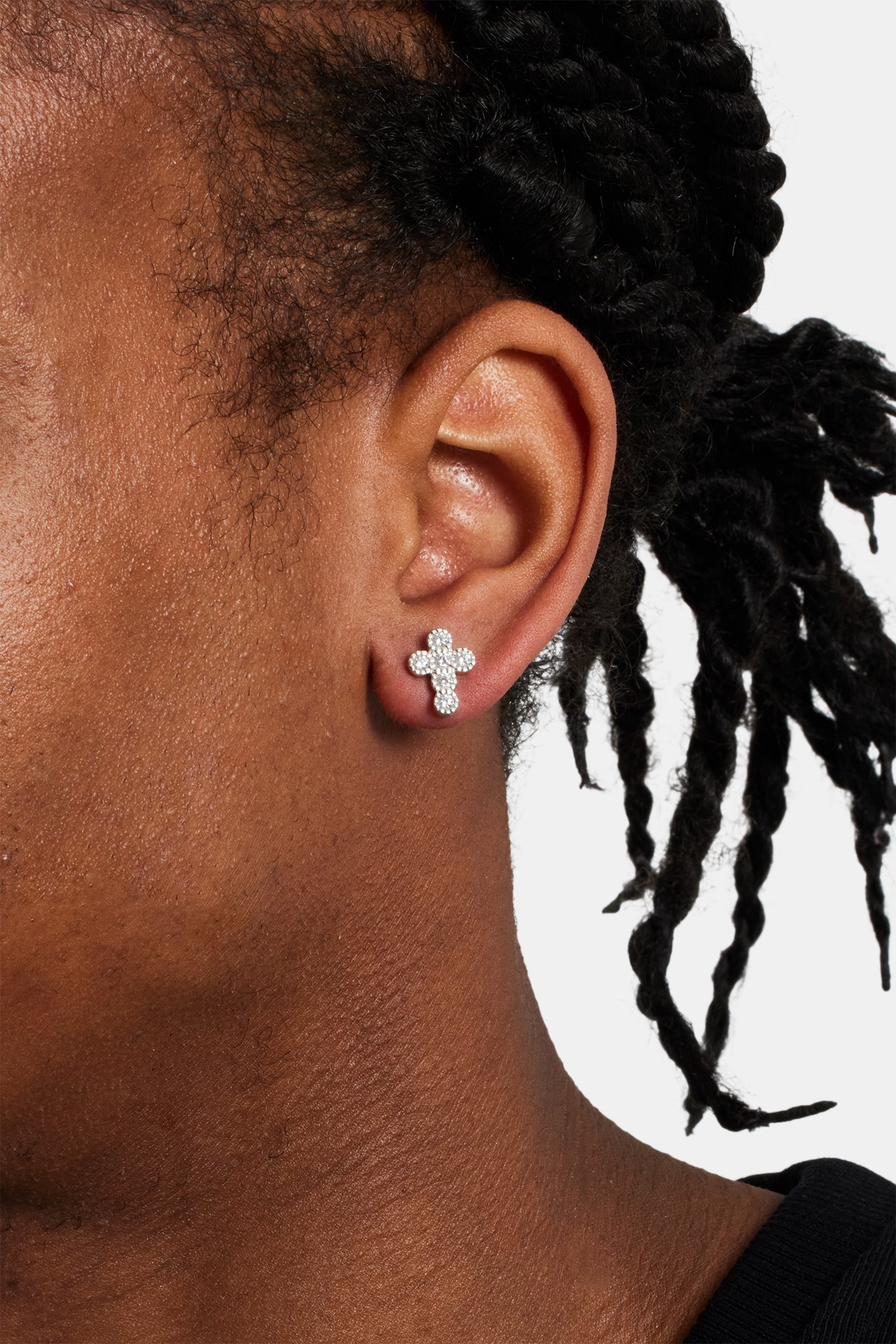 male model wearing Iced cross stud earrings